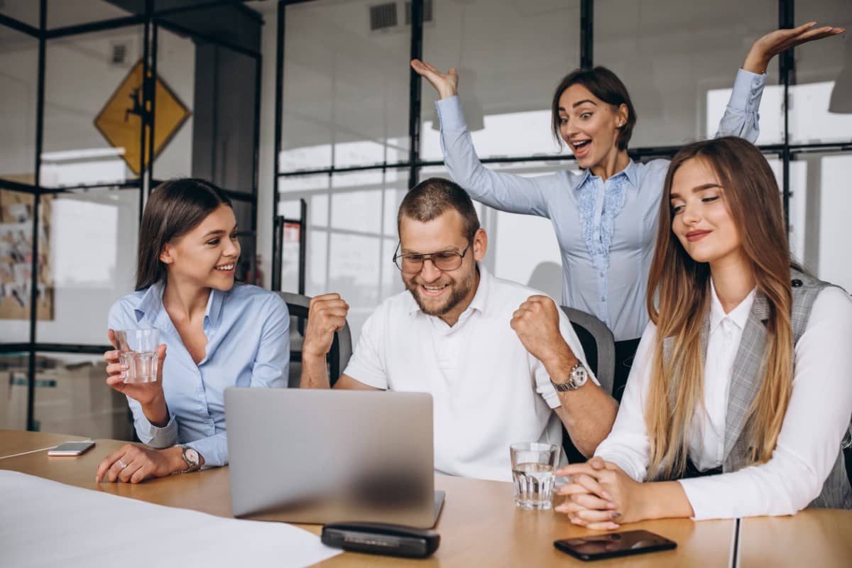 Group of people working out business plan in an office